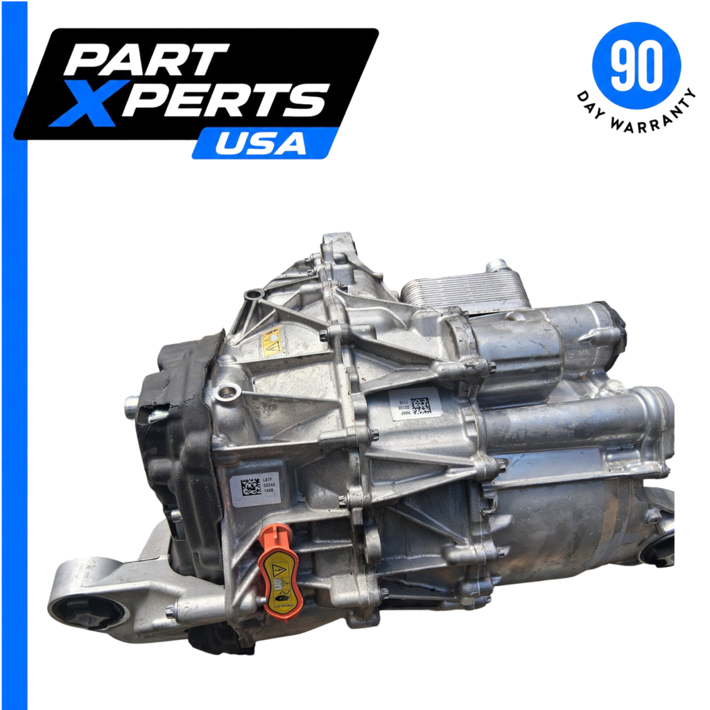 My Store OEM 2022 Tesla Model Y rear drive unit motor with 37K miles, showing metallic housing and orange safety tag