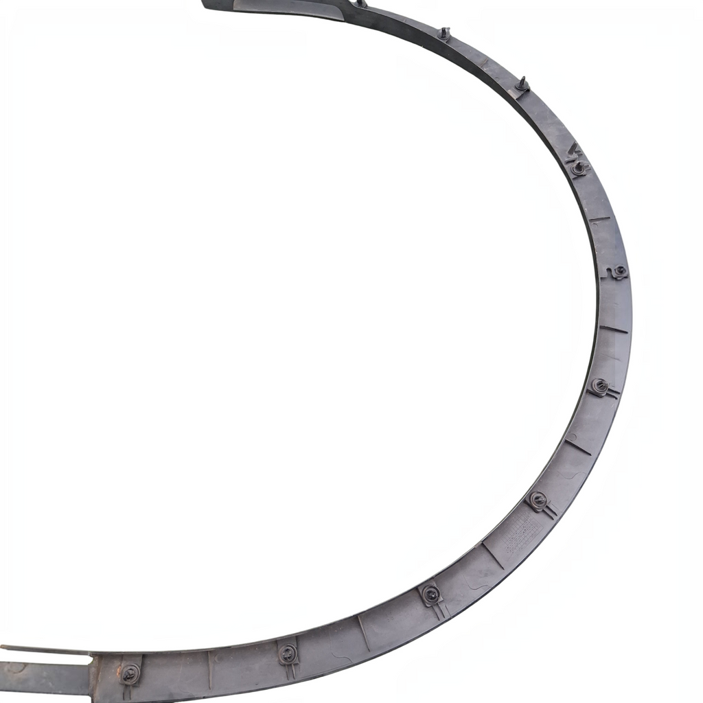 My Store OEM Tesla Model Y front right fender wheel arc molding in black plastic on green grass background
