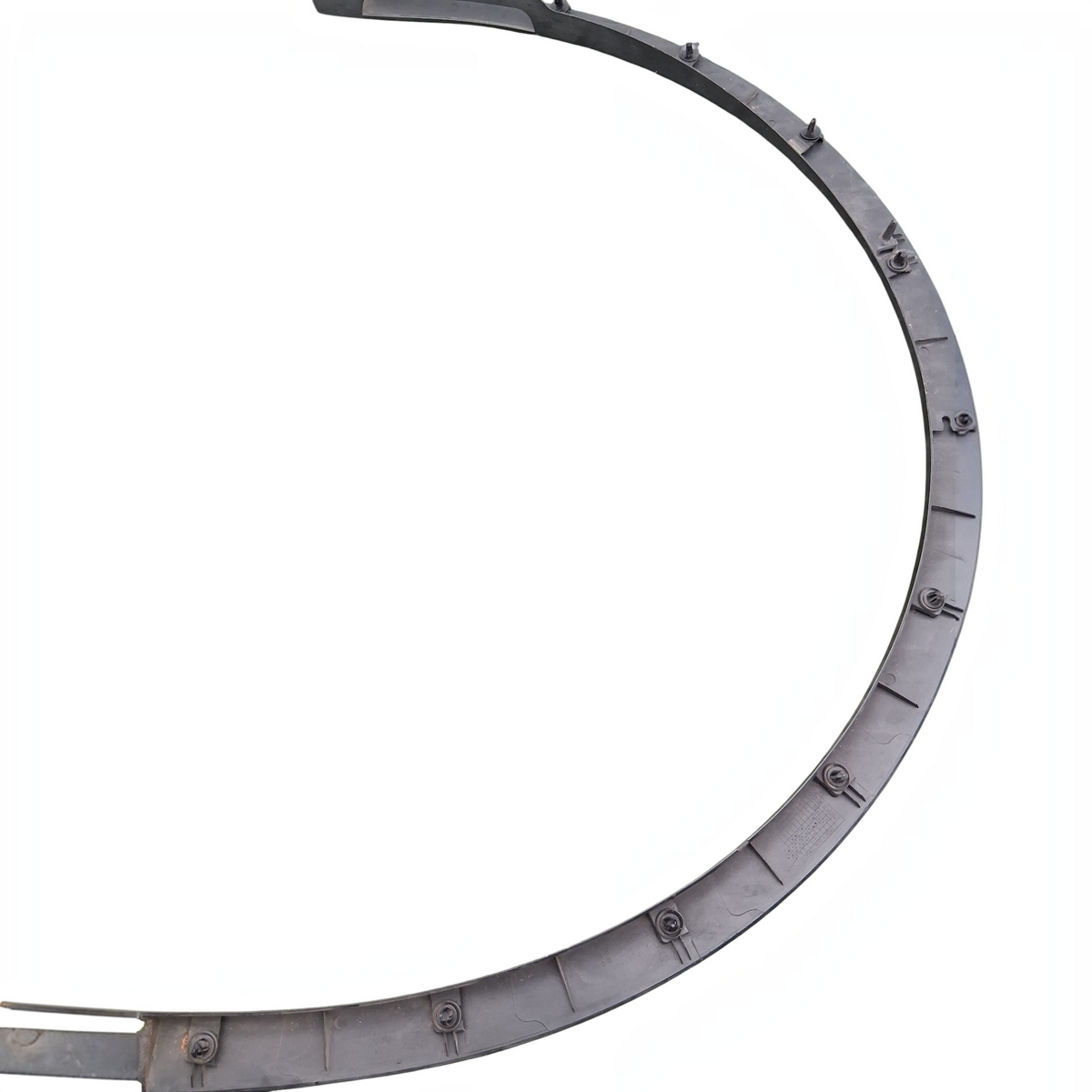 My Store OEM Tesla Model Y front right fender wheel arc molding in black plastic on green grass background